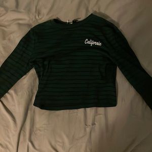 long sleeved green and black